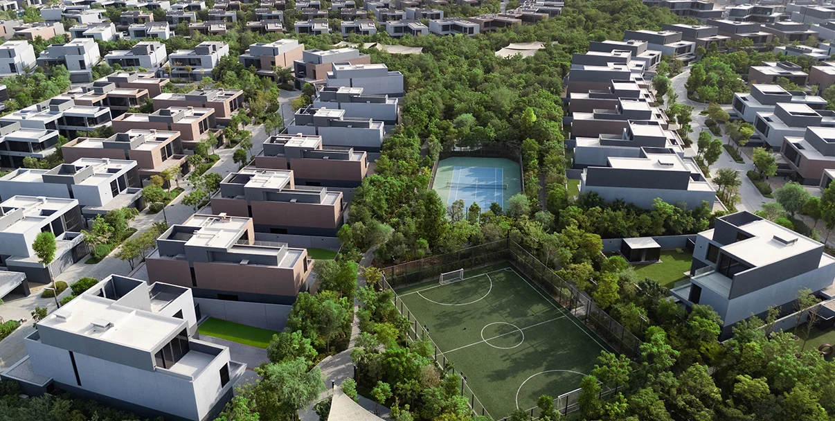 Aerial view of Masaar by Arada forest community with villas and lush green landscapes